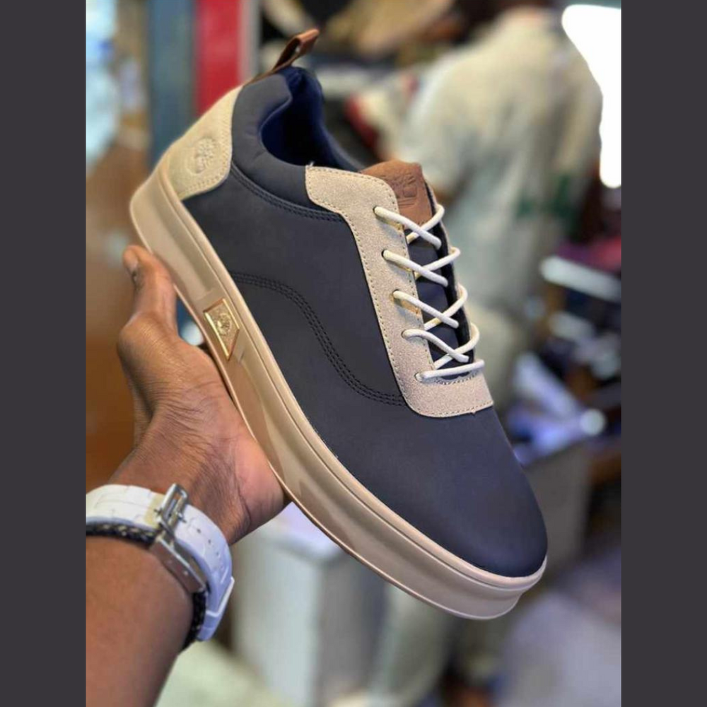 Élégance Décontractée : Sneaker Tendance en Bleu Marine et Gris pour un Style Incomparable