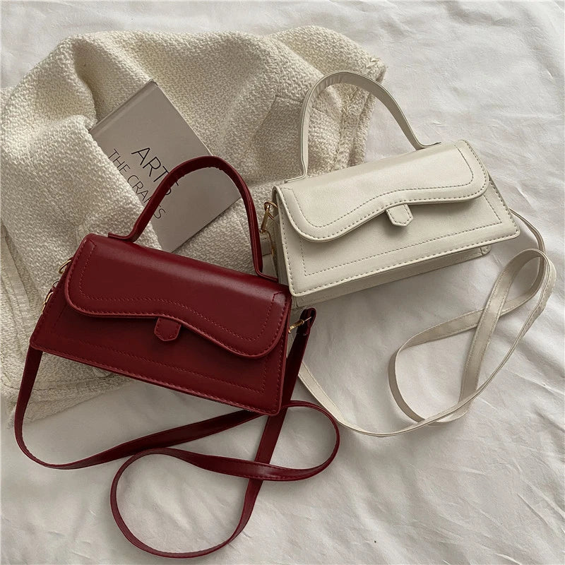 
                      
                        Solid mini handbag for women: elegance and practicality combined
                      
                    