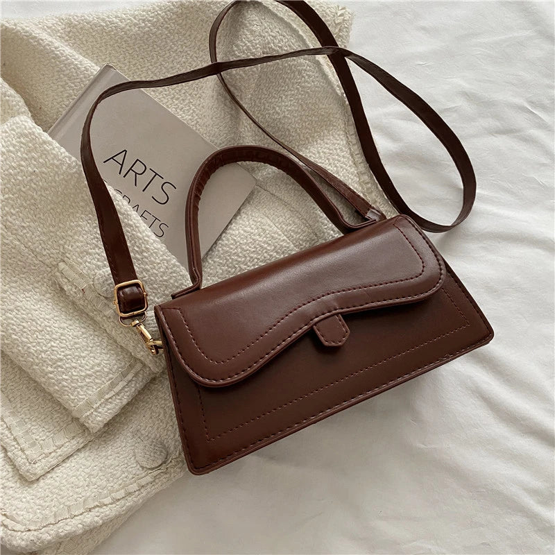 
                      
                        Solid mini handbag for women: elegance and practicality combined
                      
                    