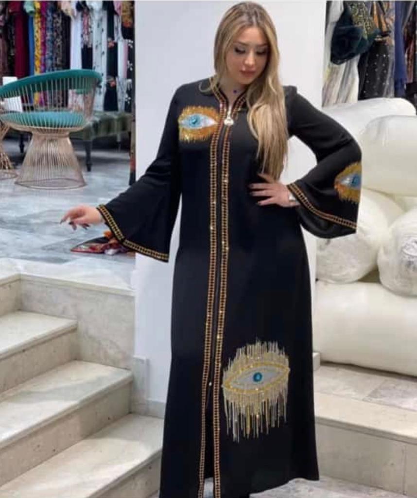 Abaya de Dubaï noire avec broderies d'œil élégantes - Ajoutez de l'éclat à votre garde-robe